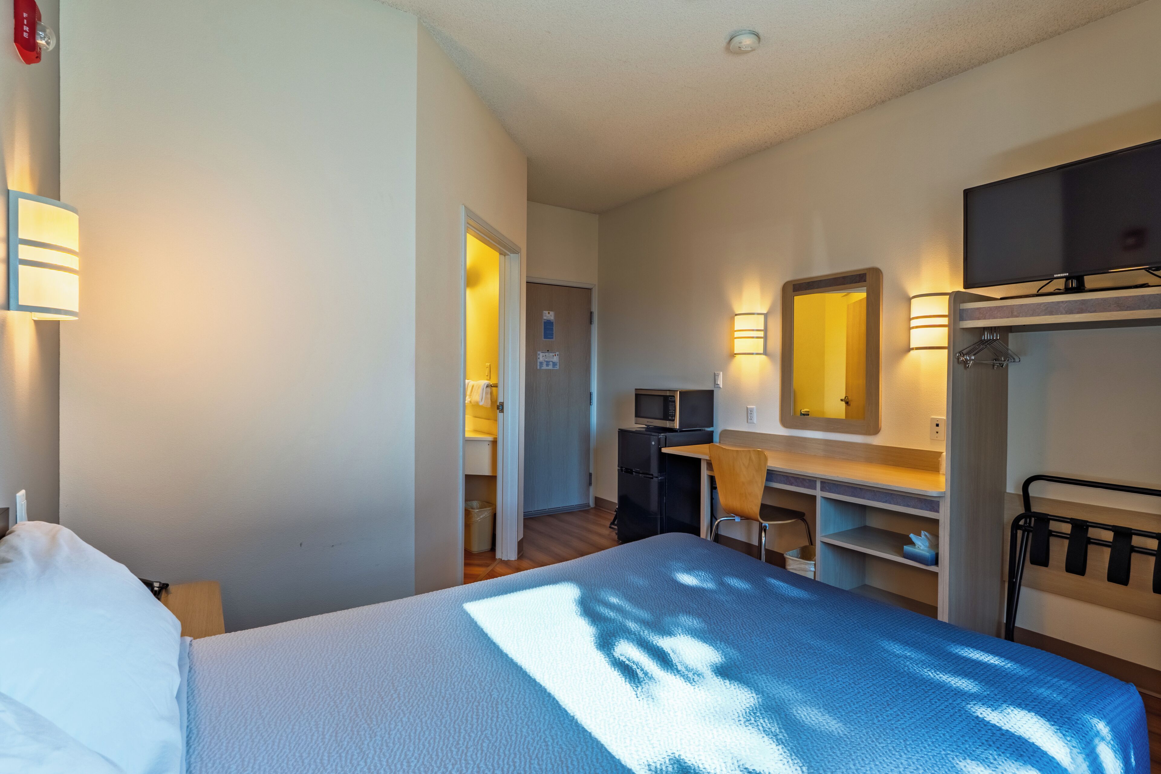 Desk, laptop workspace, free WiFi, bed sheets