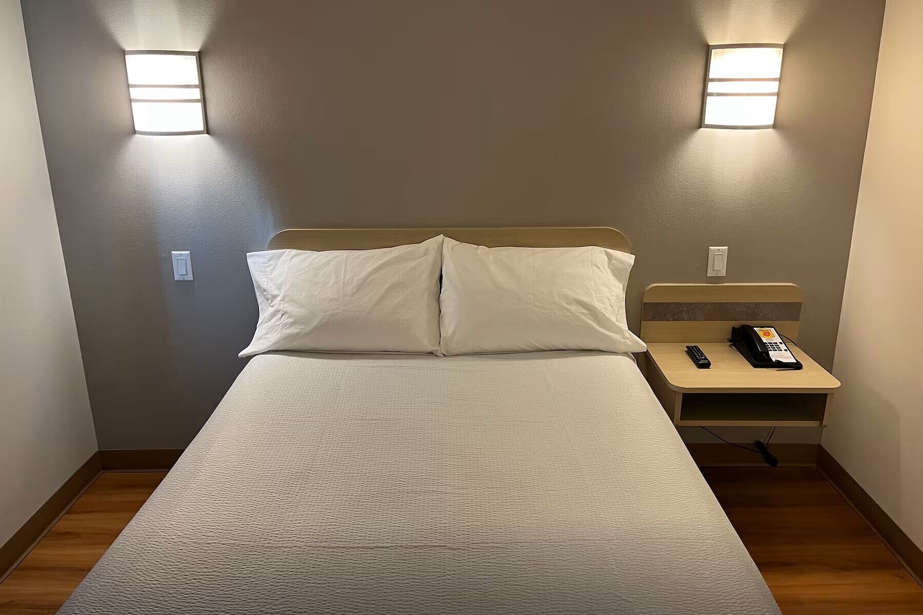 Desk, laptop workspace, free WiFi, bed sheets