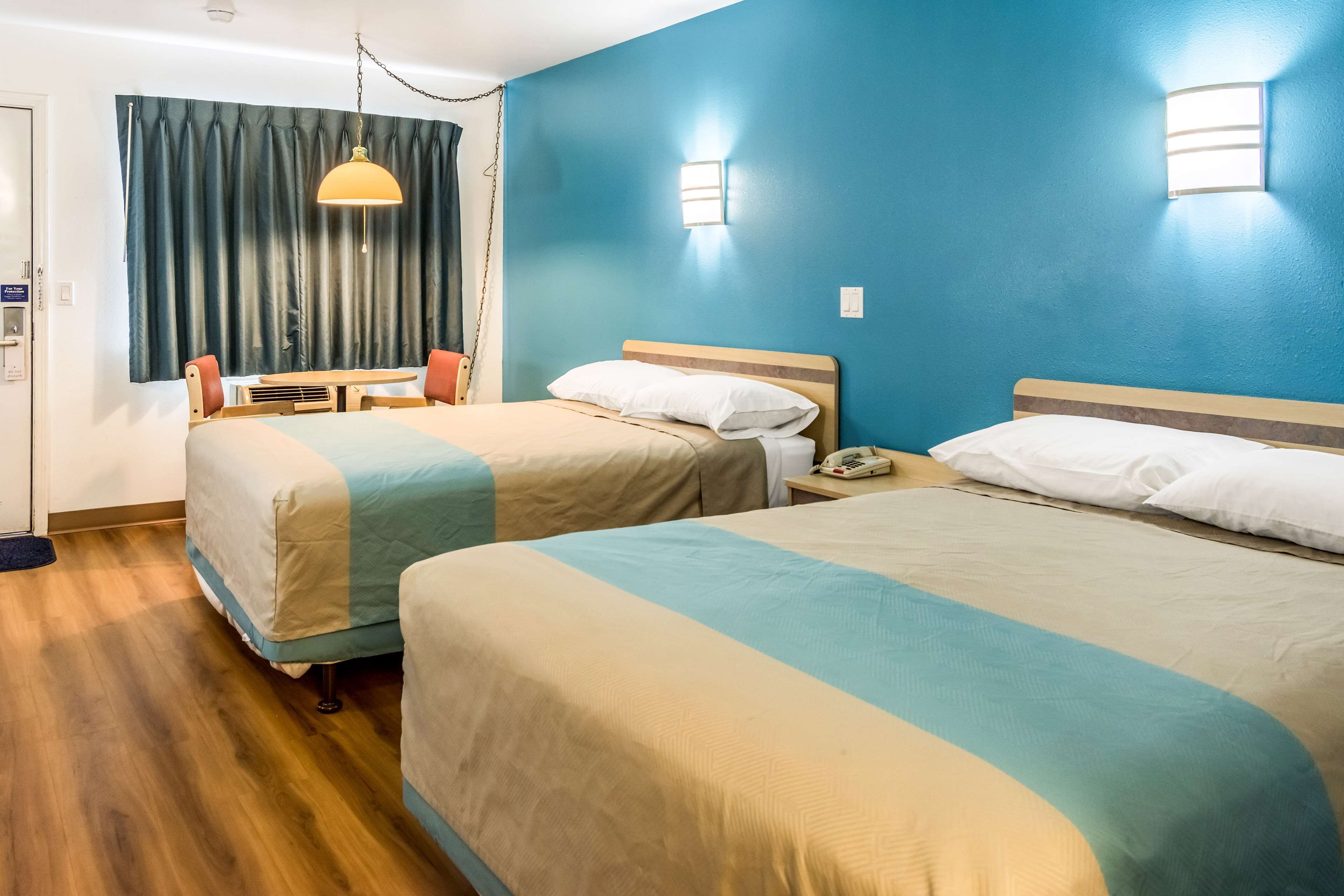 Desk, free WiFi, bed sheets, alarm clocks