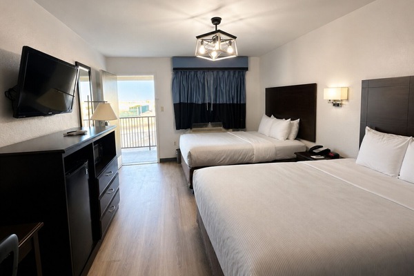 Standard Room, 2 Queen Beds, Non Smoking | Blackout curtains, iron/ironing board, free cots/infant beds, free WiFi