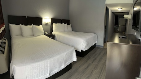 Desk, blackout curtains, iron/ironing board, free WiFi. Americas Best Value Inn & Suites Groves Port Arthur