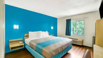 Wifi gratis, ropa de cama, despertador