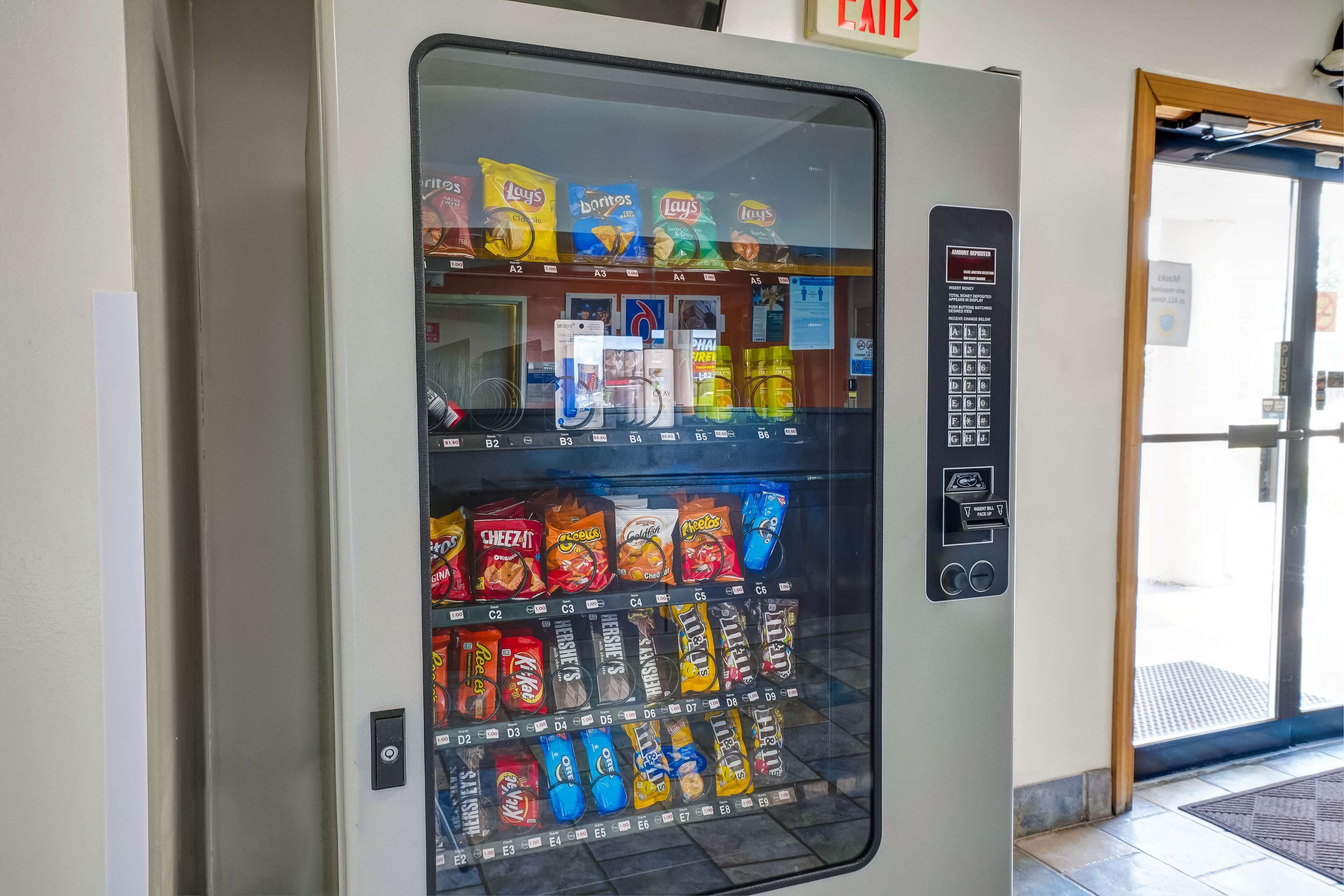 A vending machine with snacks and beverages.