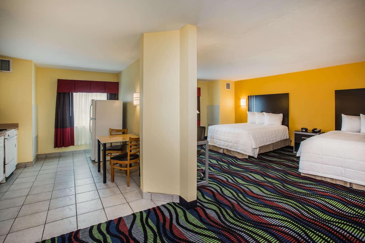 Room, 2 Queen Beds, Non Smoking, Kitchen | Frette Italian sheets, premium bedding, down comforters, pillowtop beds