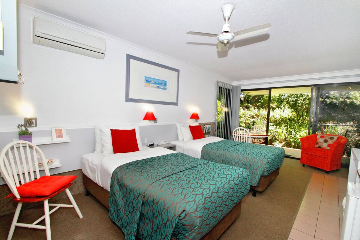 Twin Room | Premium bedding, desk, laptop workspace, iron/ironing board