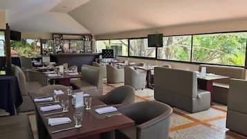 Breakfast, lunch, dinner served; Fusion cuisine, pool views