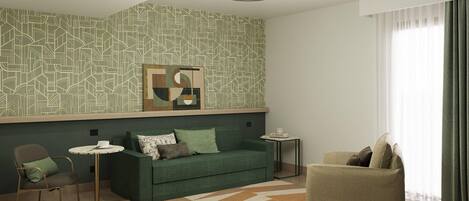 A modern living room with a green sofa, a round coffee table, and a patterned wall.