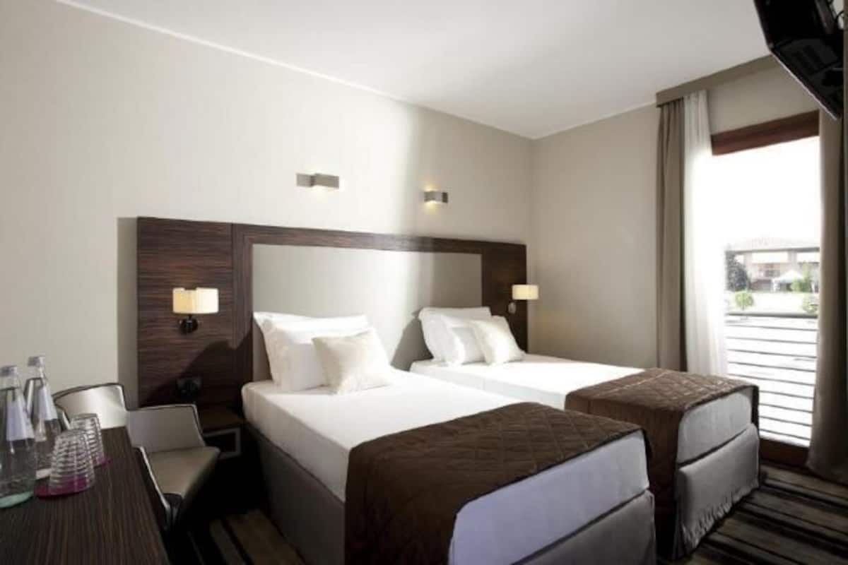 Down duvets, minibar, in-room safe, desk