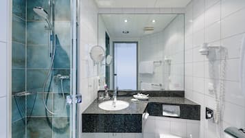 Shower, eco-friendly toiletries, hair dryer, towels