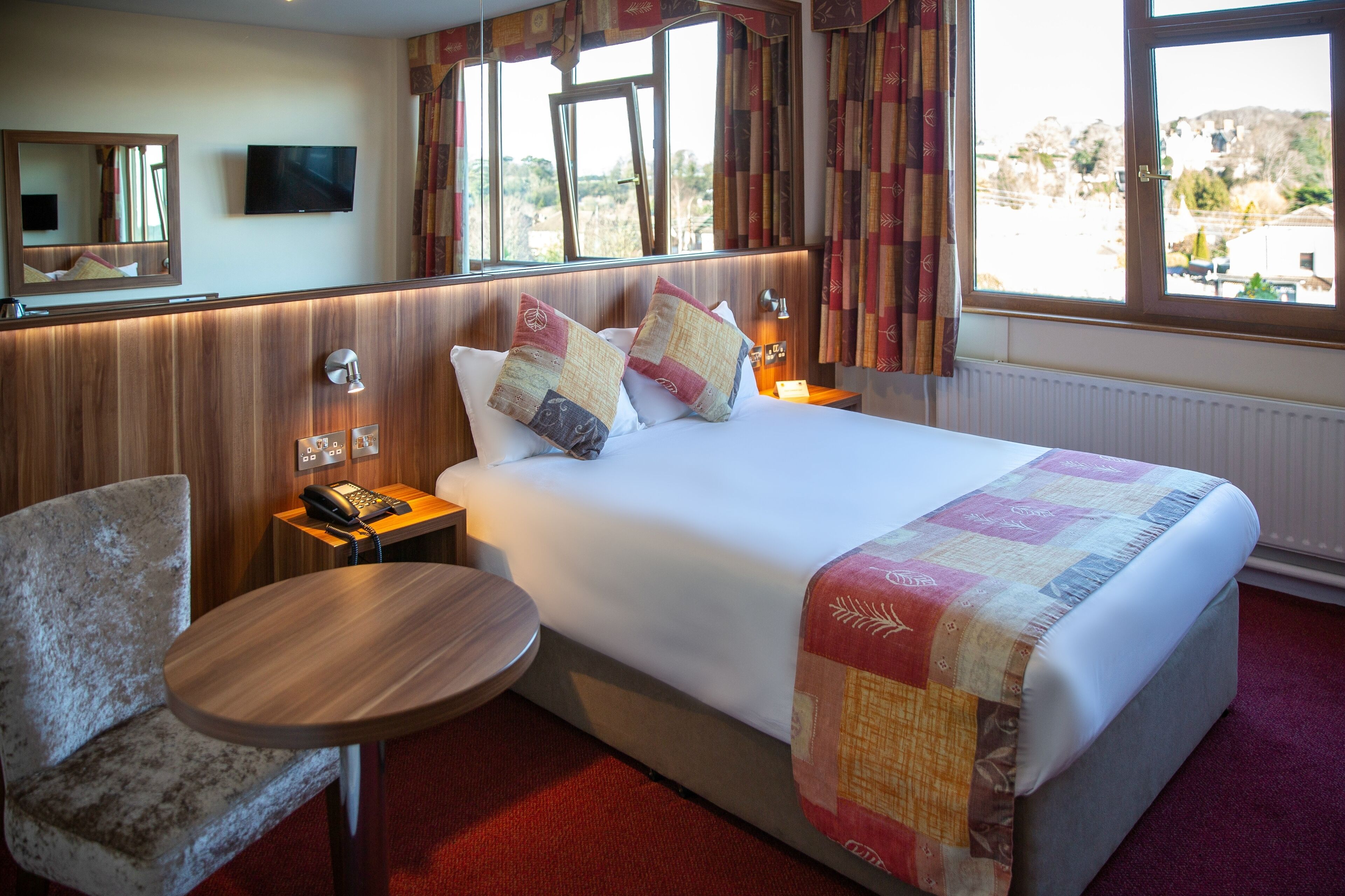 desk, laptop workspace, blackout curtains, iron/ironing board