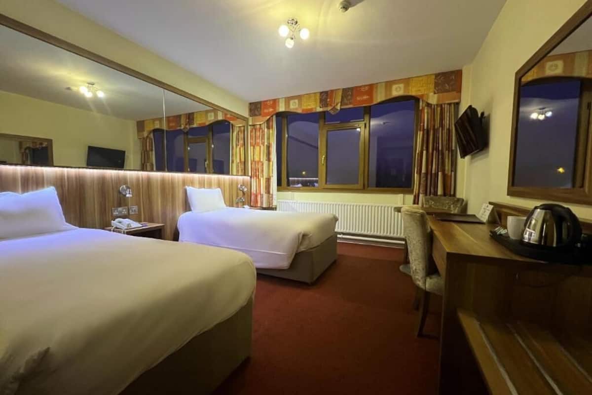 standard twin room, 2 single beds | desk, laptop workspace, blackout curtains, iron/ironing board