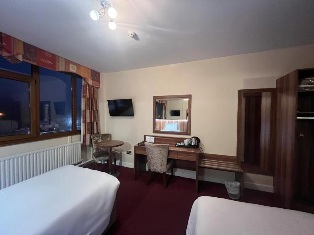 standard twin room, 2 single beds | desk, laptop workspace, blackout curtains, iron/ironing board