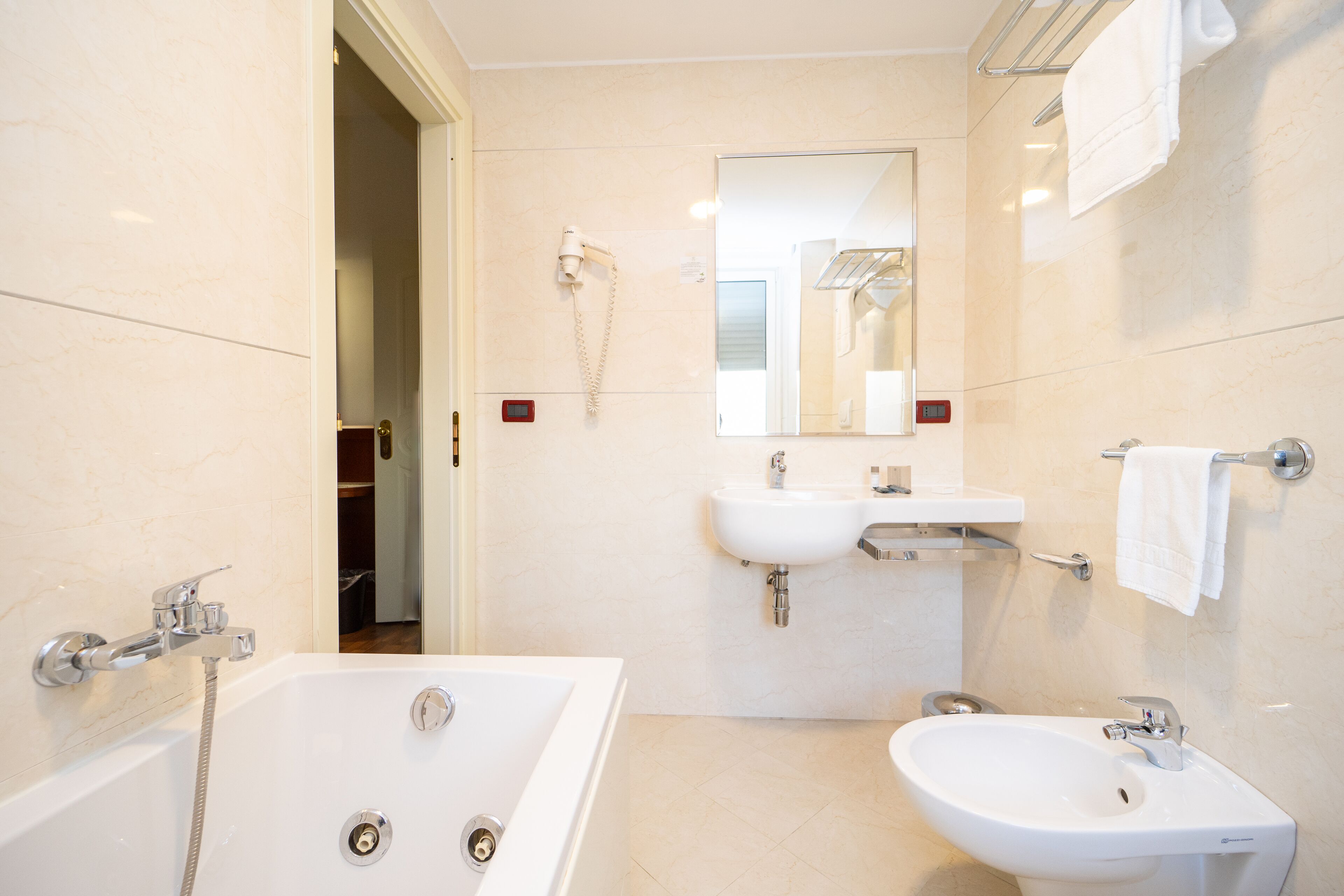 deluxe double or twin room | bathroom | free toiletries, hair dryer, bidet, towels