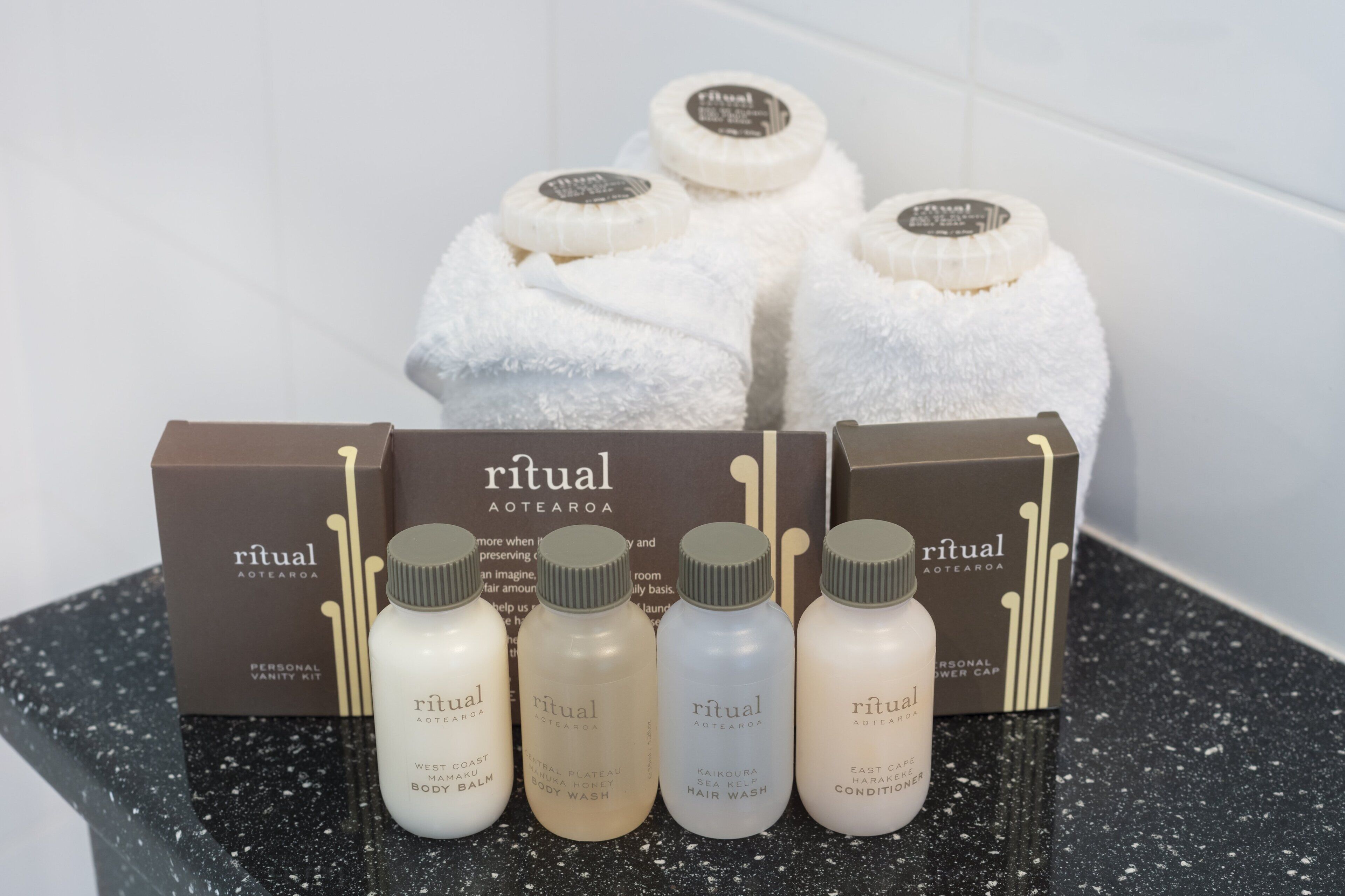 eco-friendly toiletries, hair dryer, bathrobes, towels