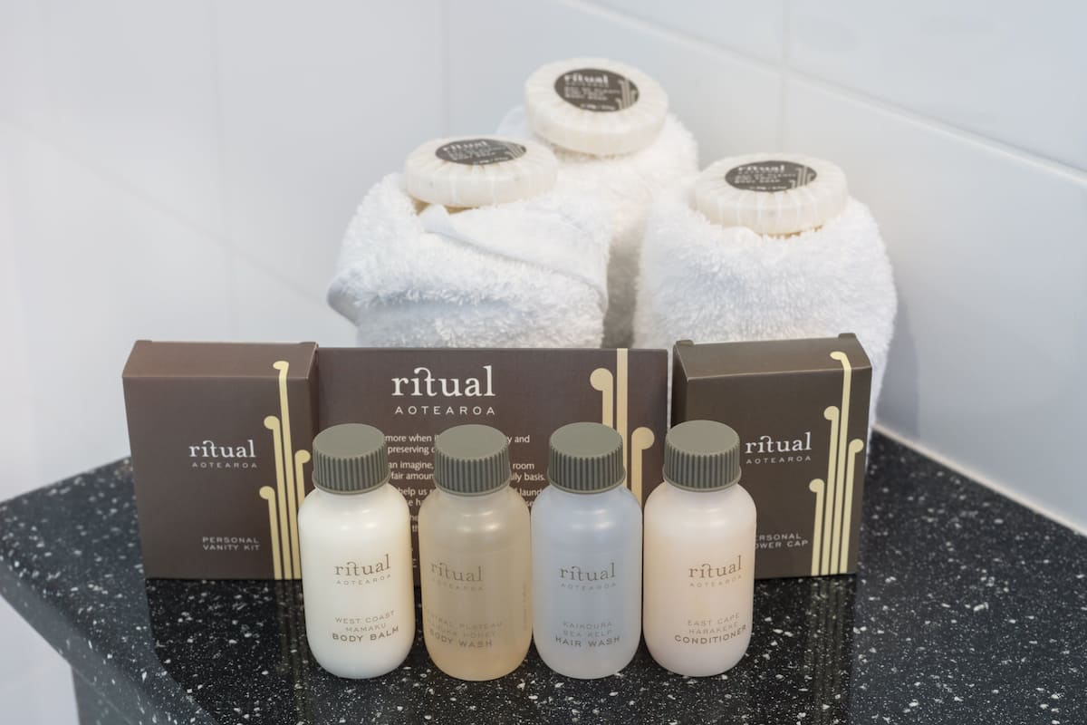 eco-friendly toiletries, hair dryer, bathrobes, towels