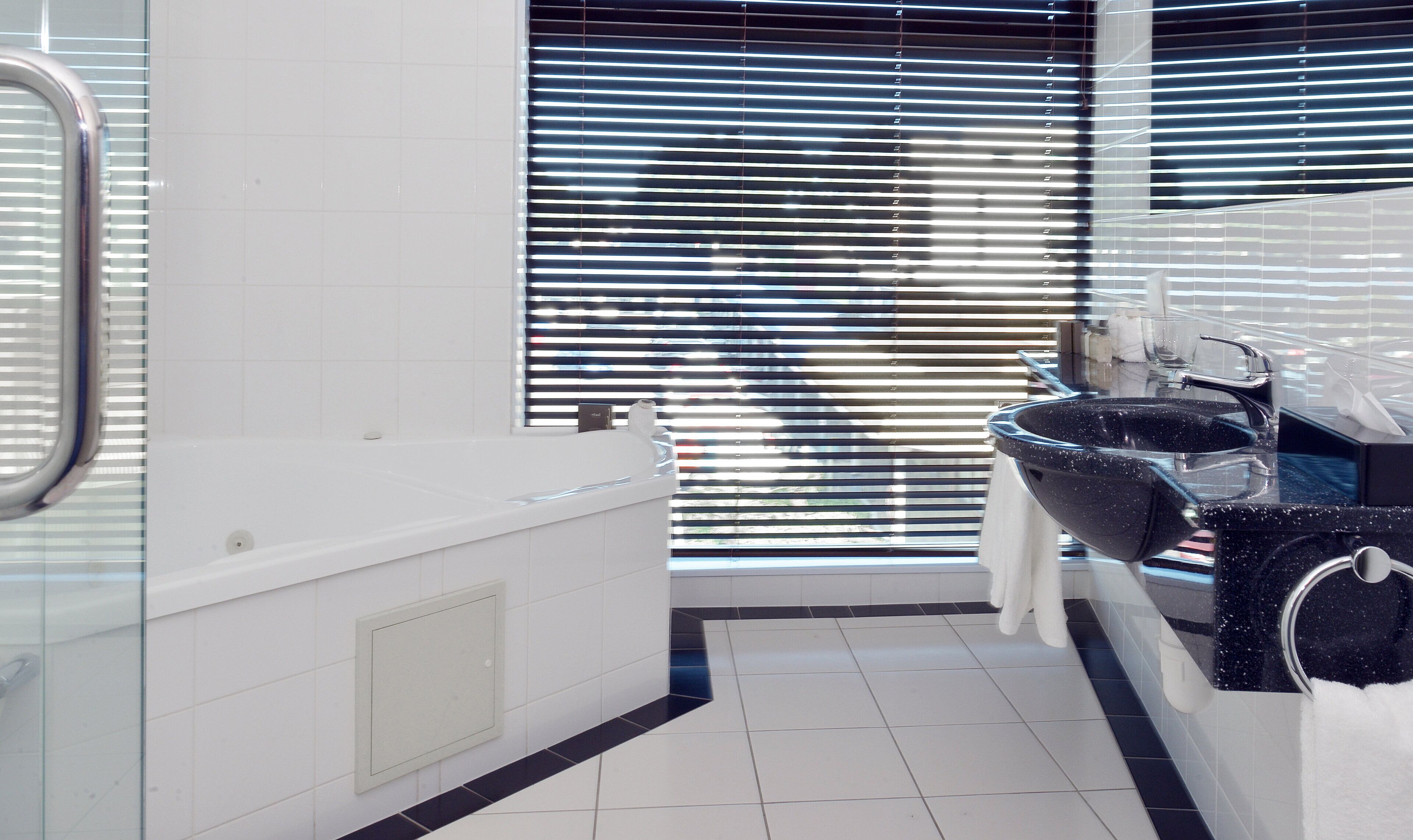 family suite | bathroom | eco-friendly toiletries, hair dryer, bathrobes, towels
