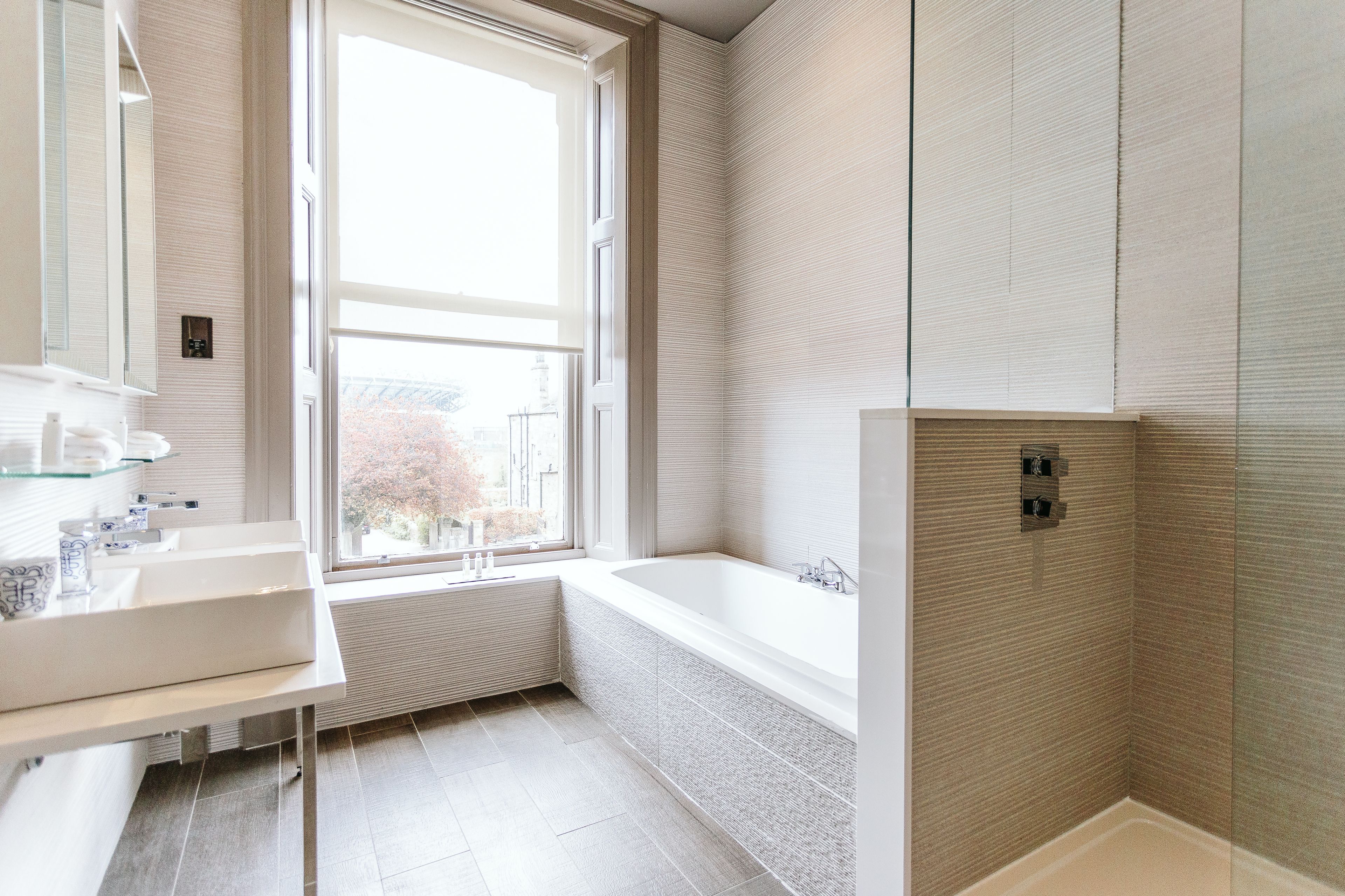 luxe double or twin room | bathroom | hair dryer, bathrobes, towels