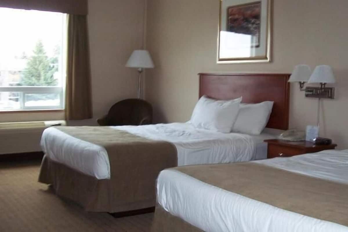 Desk, laptop workspace, blackout drapes, iron/ironing board