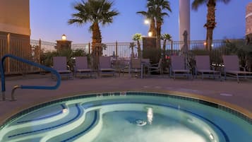 Outdoor pool, open 9:00 AM to midnight, pool loungers