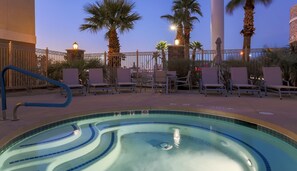 Outdoor pool, open 9:00 AM to midnight, pool loungers - Holiday Inn Express Las Vegas - Stadium Area by IHG (Las Vegas)