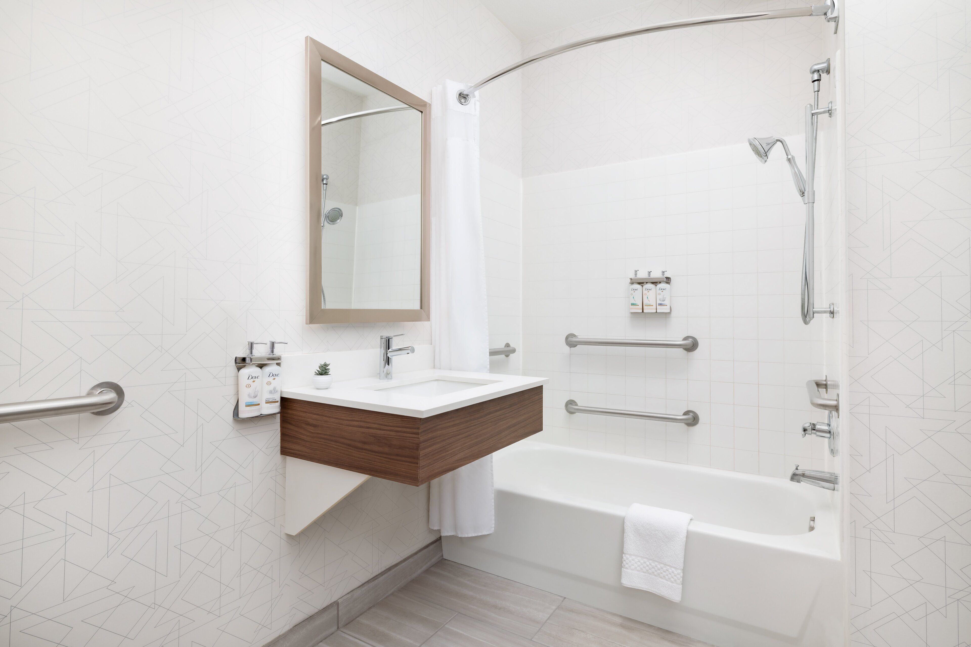 combined shower/bathtub, free toiletries, hair dryer, towels