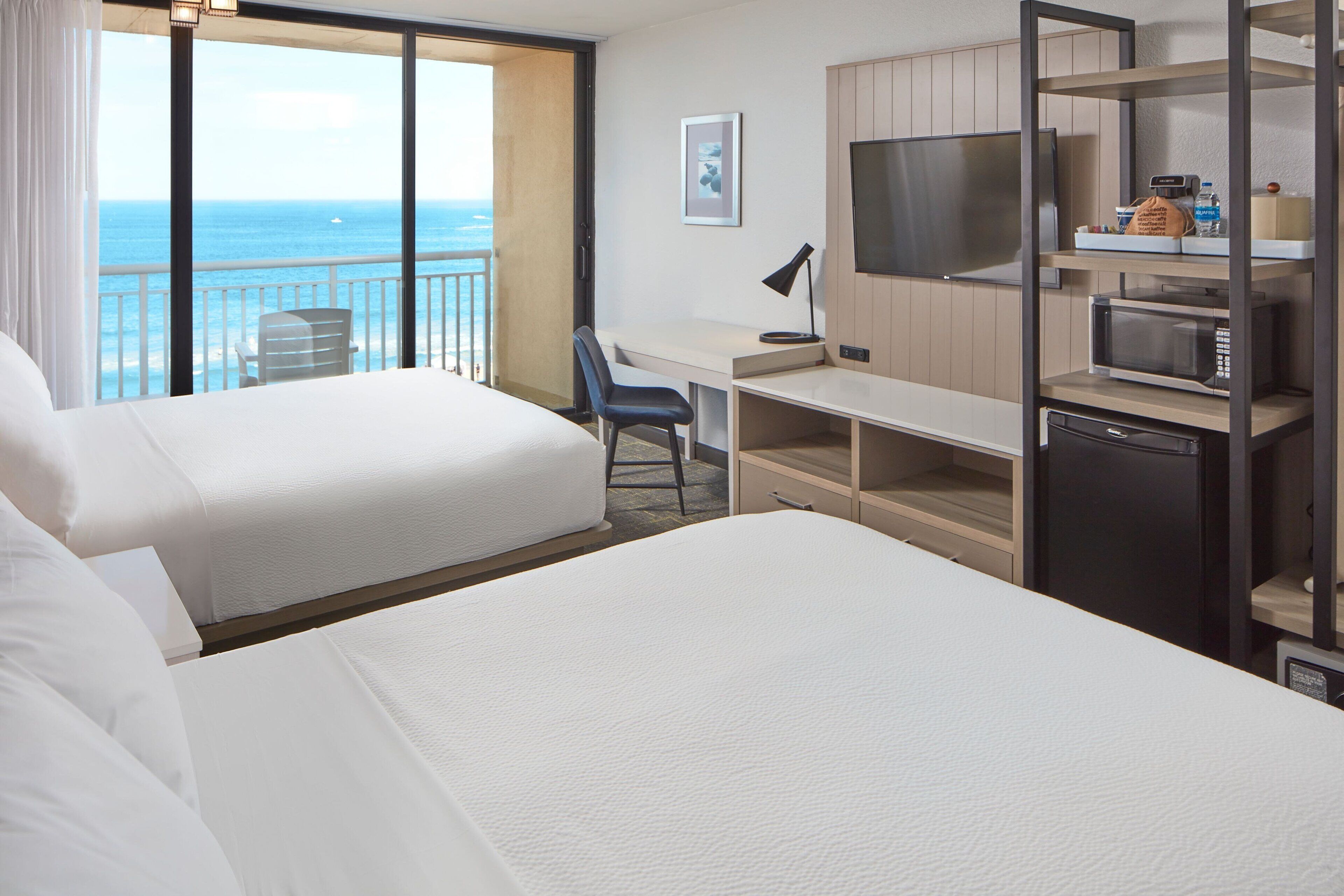 room, 2 queen beds, balcony, oceanfront | premium bedding, pillow-top beds, in-room safe, individually decorated