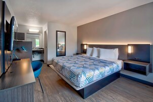 Tabla de planchar con plancha, wifi gratis y ropa de cama 