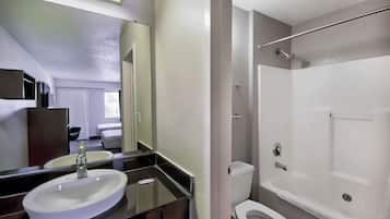 Combined shower/tub, towels, soap, toilet paper