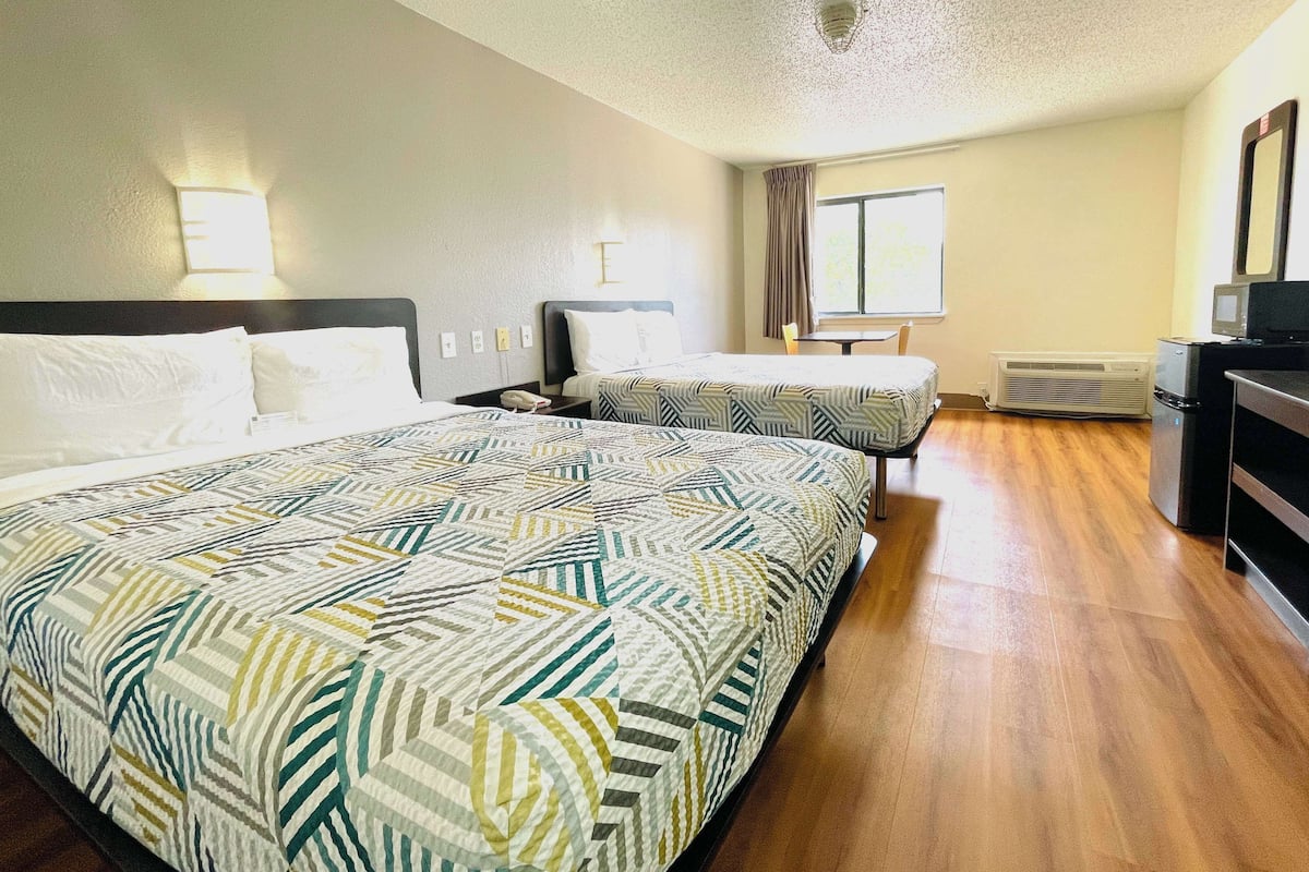 Desk, laptop workspace, free WiFi, bed sheets