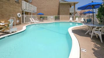 Outdoor pool, pool umbrellas, sun loungers