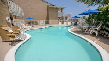 Outdoor pool, pool umbrellas, sun loungers