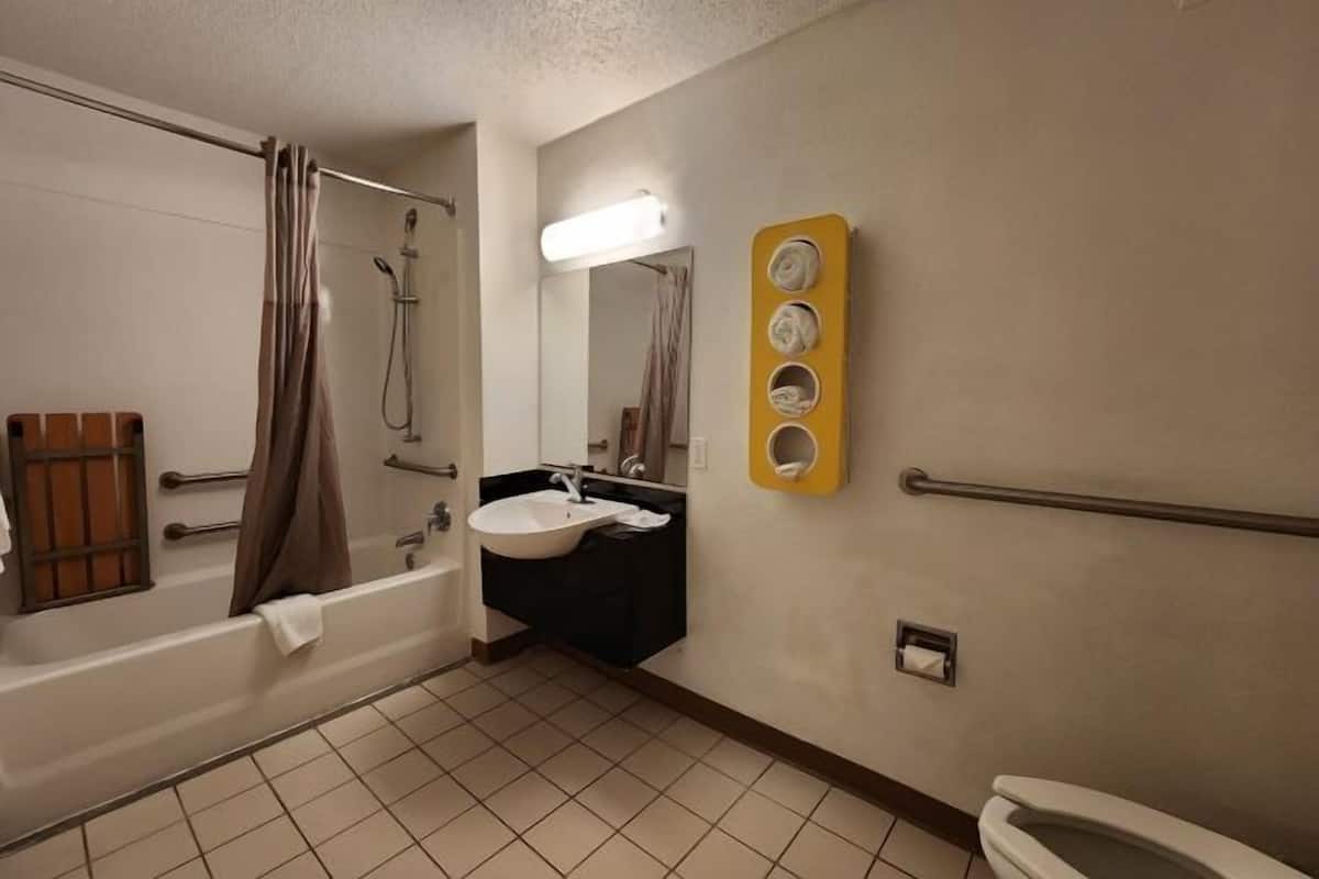 Combined shower/tub, hair dryer, towels, soap