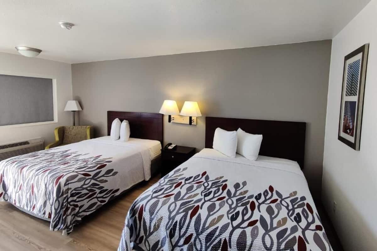 Premium bedding, memory-foam beds, desk, blackout curtains