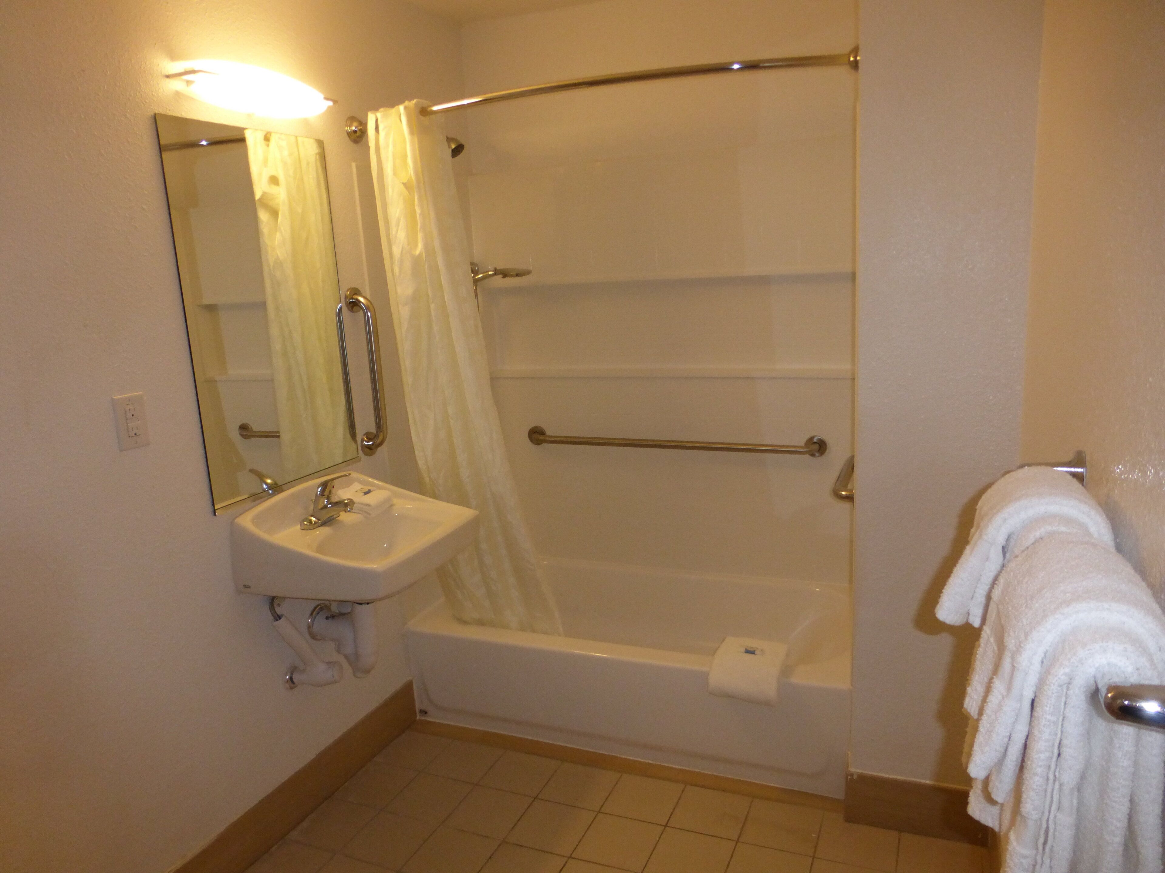 Combined shower/tub, towels, soap, toilet paper