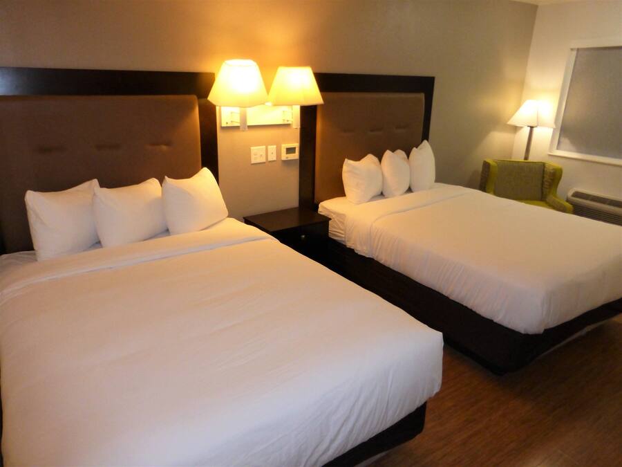 Premium bedding, memory-foam beds, desk, blackout curtains