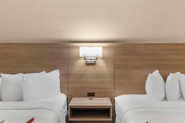 Premium bedding, memory-foam beds, desk, blackout curtains