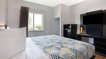 Desk, laptop workspace, free WiFi, bed sheets