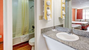 Combined shower/bathtub, towels, soap