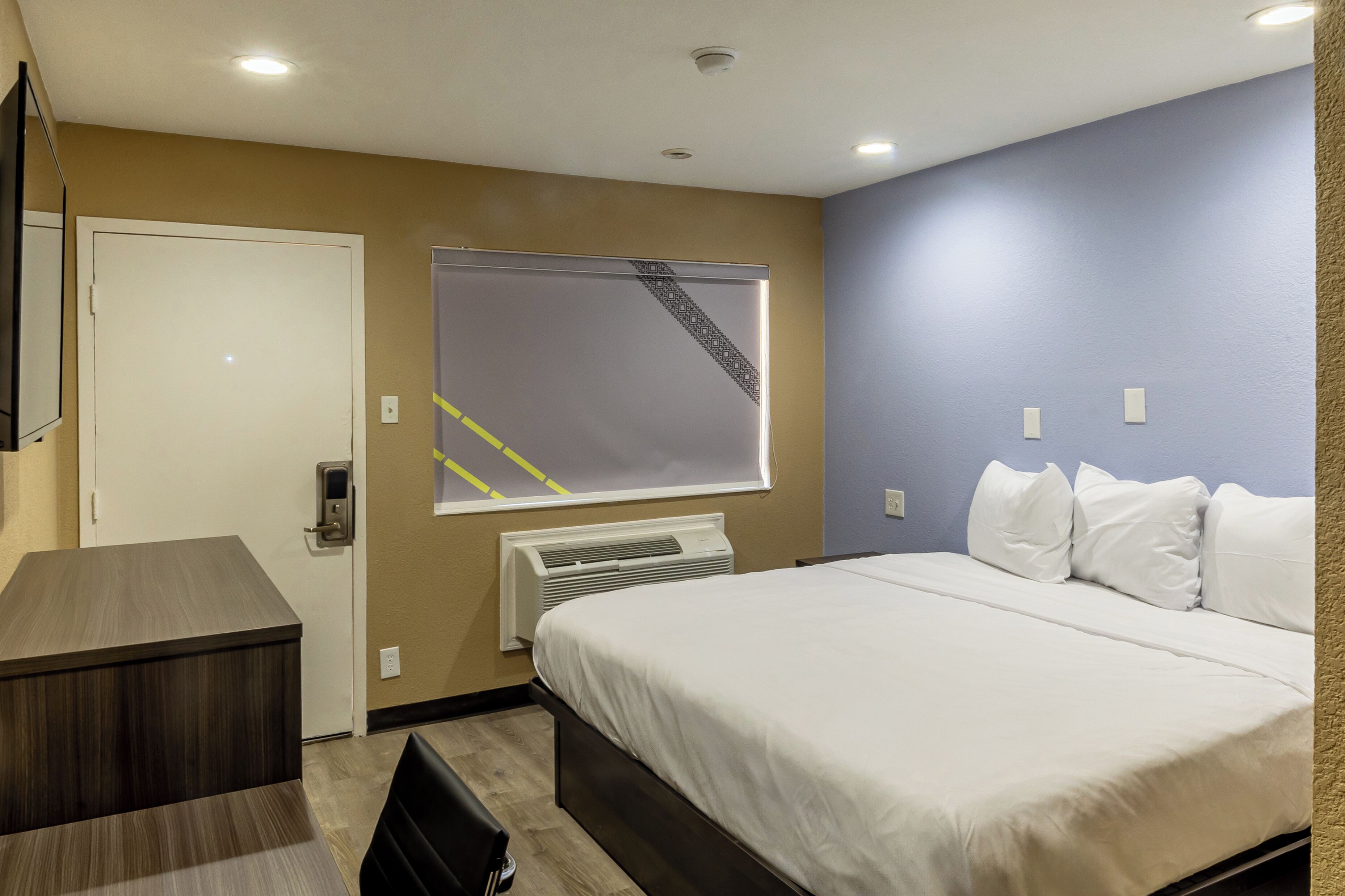 Desk, laptop workspace, free WiFi, bed sheets