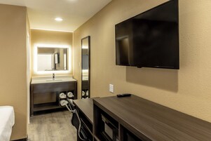 Desk, laptop workspace, free WiFi, bed sheets