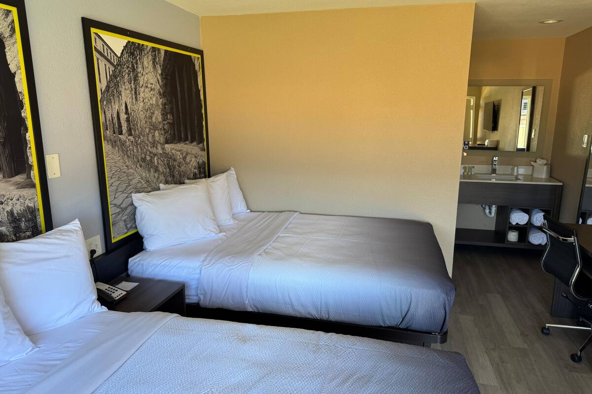 Room, 2 Double Beds, Non Smoking | Desk, laptop workspace, WiFi (free), bed sheets