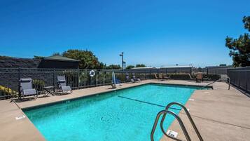 Seasonal outdoor pool, open 10:00 AM to 9:00 PM, sun loungers