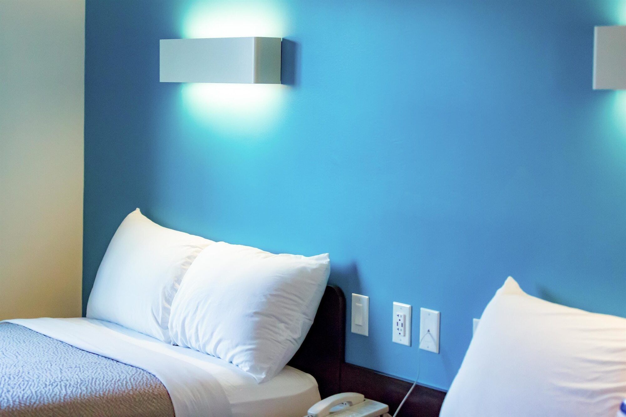 Desk, free WiFi, bed sheets, alarm clocks