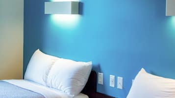 Desk, free WiFi, bed sheets, alarm clocks