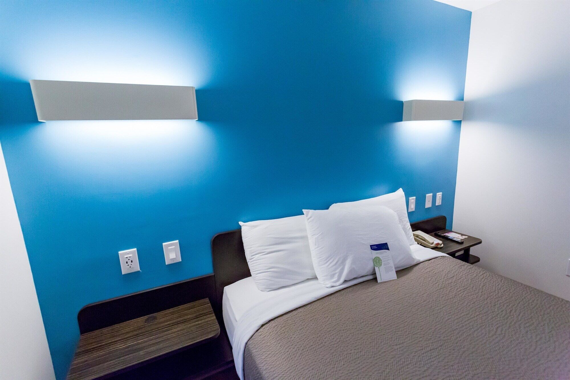 Desk, free WiFi, bed sheets, alarm clocks