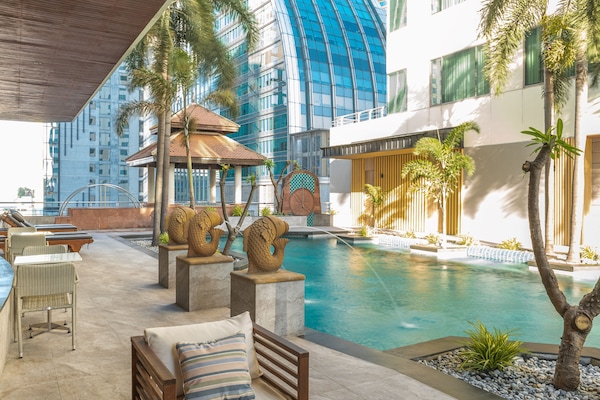 Outdoor pool, pool umbrellas, pool loungers