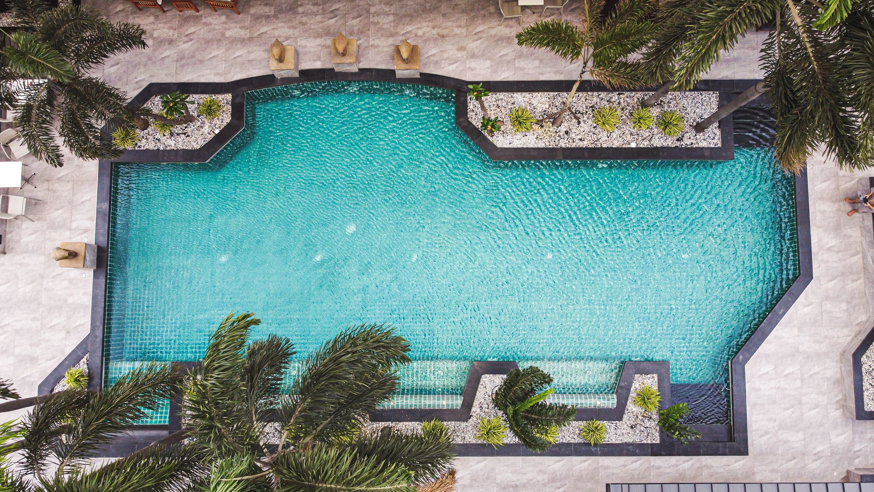 outdoor pool, pool umbrellas, pool loungers