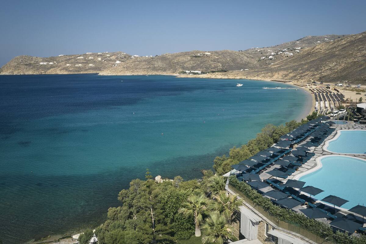 seasonal outdoor pool, open 11:00 am to 7:00 pm, pool umbrellas
