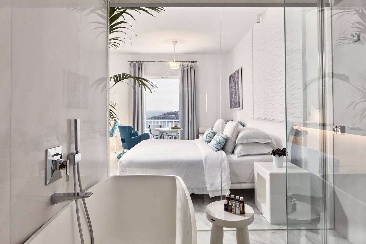 suite, jetted tub, sea view (thalassa) | bathroom | designer toiletries, hair dryer, bathrobes, slippers