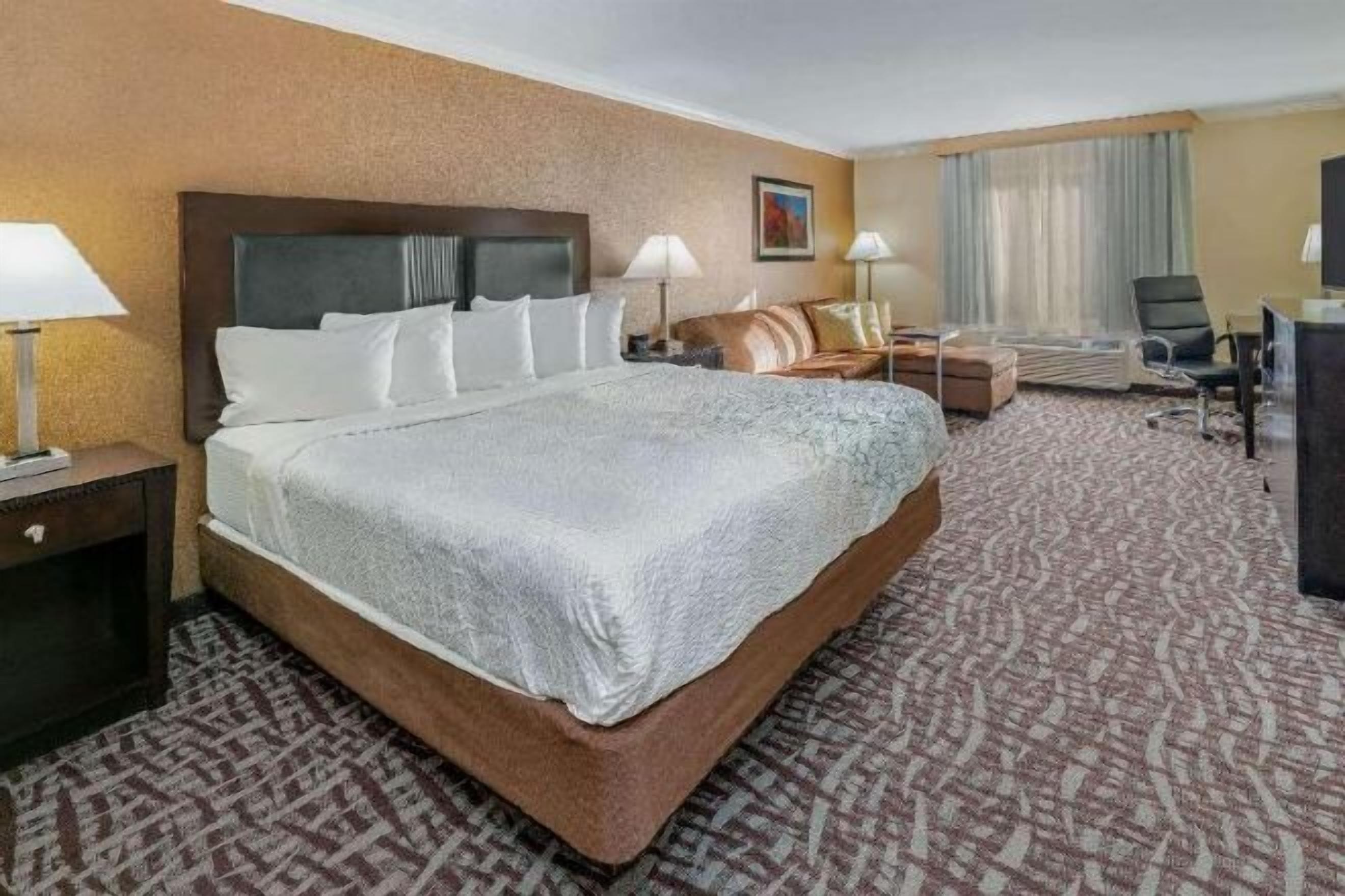 Desk, blackout drapes, iron/ironing board, free cribs/infant beds